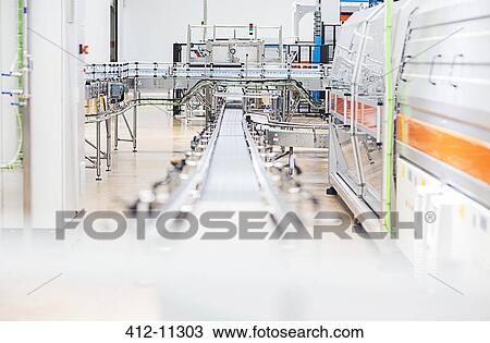 Stock Image - Conveyor belt in factory. Fotosearch