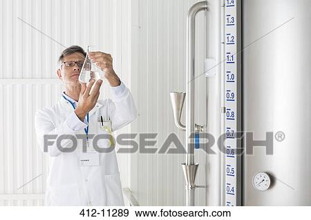 Scientist working in laboratory View Large Photo Image Stock Photo - Scientist working in laboratory. Fotosearch