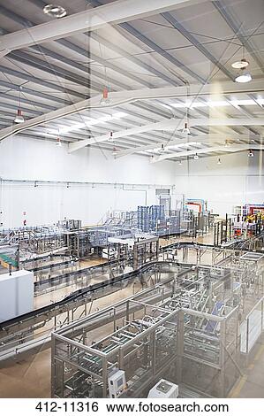 Stock Photograph - View of machinery in factory. Fotosearch