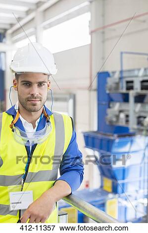 Worker in factory View Large Photo Image Stock Photo - Worker in factory. Fotosearch