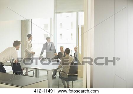 Business people talking in meeting View Large Photo Image Stock Image - Business people talking in meeting. Fotosearch