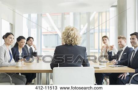 Business people talking in meeting View Large Photo Image Stock Image - Business people talking in meeting. Fotosearch