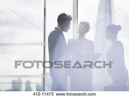Business people talking in office View Large Photo Image Stock Image - Business people talking in office. Fotosearch