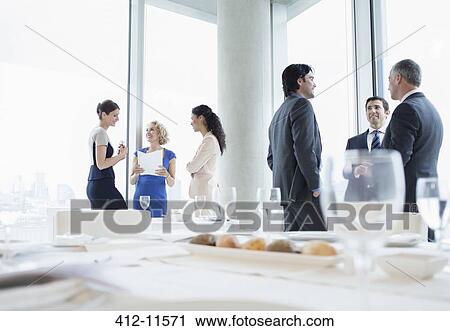 Business people talking in restaurant View Large Photo Image Stock Image - Business people talking in restaurant. Fotosearch