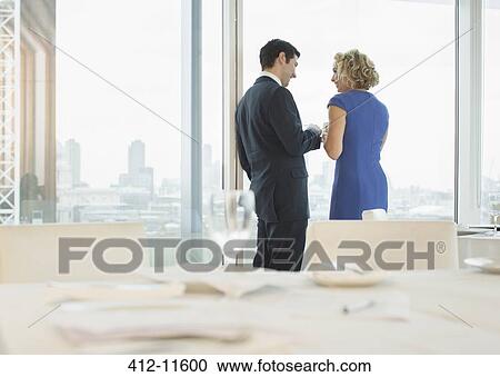 Business people talking in restaurant View Large Photo Image Stock Image - Business people talking in restaurant. Fotosearch