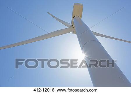Stock Photograph - Low angle view of wind turbine. Fotosearch