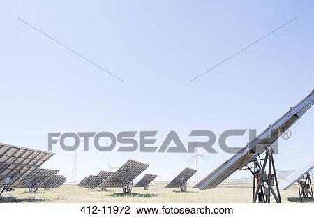 Solar panels in rural landscape View Large Photo Image Stock Image - Solar panels in rural landscape. Fotosearch