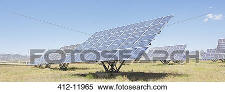 Solar panels in rural landscape View Large Photo Image Stock Photography - Solar panels in rural landscape. Fotosearch