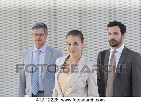 Stock Photograph - Business people smiling outdoors. Fotosearch
