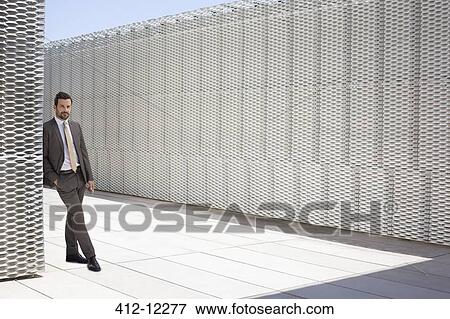 Stock Photo - Businessman standing outdoors. Fotosearch