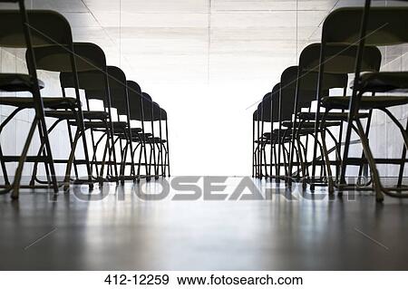 Stock Photo - Empty chairs in office. Fotosearch