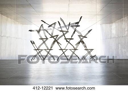 Silhouette of office chair installation art View Large Photo Image Stock Image - Silhouette of office chair installation art. Fotosearch