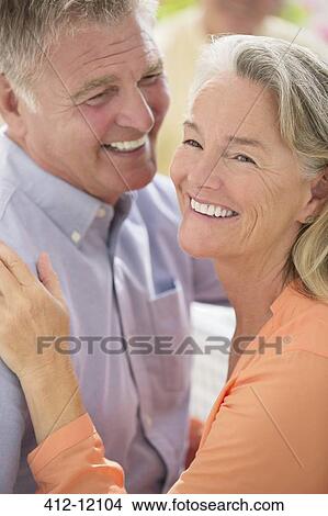Happy senior couple hugging View Large Photo Image Picture - Happy senior couple hugging. Fotosearch