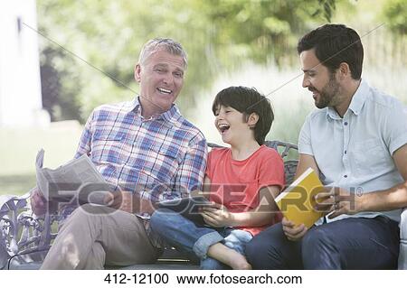 Multi-generation men laughing on bench View Large Photo Image Stock Image - Multi-generation men laughing on bench. Fotosearch