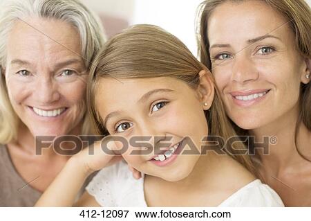 Multi-generation women smiling View Large Photo Image Stock Photo - Multi-generation women smiling. Fotosearch