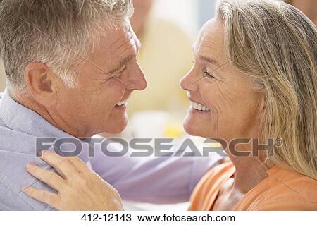 Senior couple hugging View Large Photo Image Stock Image - Senior couple hugging. Fotosearch