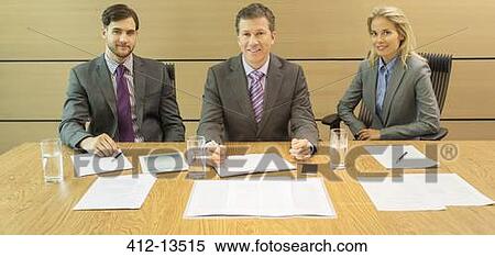 Business people sitting in meeting View Large Photo Image Stock Photography - Business people sitting in meeting. Fotosearch