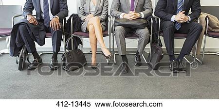 Business people sitting in waiting area View Large Photo Image Stock Photography - Business people sitting in waiting area. Fotosearch