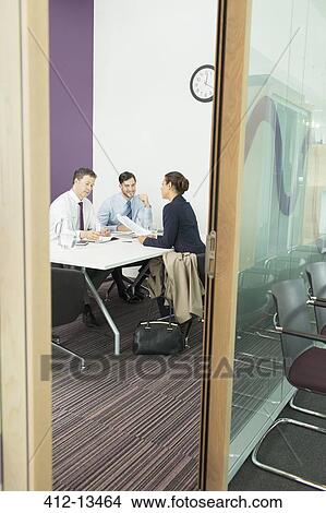 Business people talking in meeting View Large Photo Image Picture - Business people talking in meeting. Fotosearch