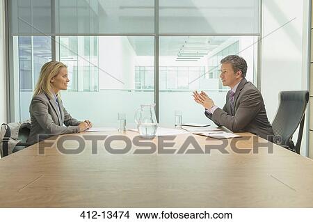Business people talking in meeting View Large Photo Image Picture - Business people talking in meeting. Fotosearch