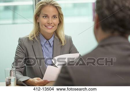 Business people talking in meeting View Large Photo Image Picture - Business people talking in meeting. Fotosearch