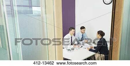 Business people talking in meeting View Large Photo Image Stock Image - Business people talking in meeting. Fotosearch
