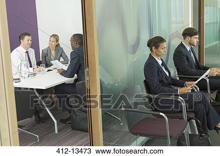 Business people talking in meeting View Large Photo Image Stock Image - Business people talking in meeting. Fotosearch