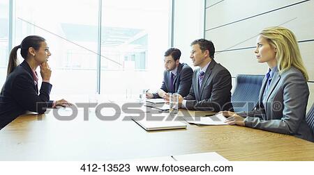 Business people talking in meeting View Large Photo Image Stock Image - Business people talking in meeting. Fotosearch