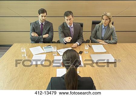 Stock Photo - Business people talking in meeting. Fotosearch
