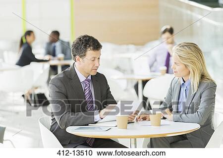 Business people talking in office View Large Photo Image Stock Image - Business people talking in office. Fotosearch