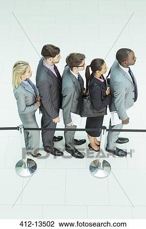 Business people waiting in line View Large Photo Image Stock Image - Business people waiting in line. Fotosearch