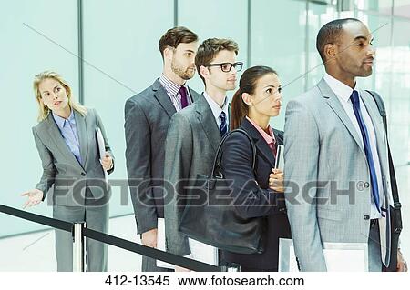 Stock Photography - Business people waiting in line. Fotosearch