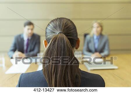 Businesswoman sitting in meeting View Large Photo Image Stock Photo - Businesswoman sitting in meeting. Fotosearch