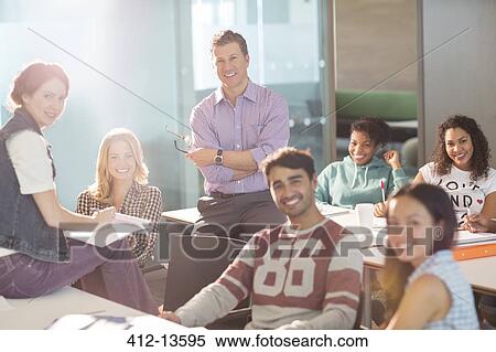 Professor and university students smiling in classroom View Large Photo Image Stock Photography - Professor and university students smiling in classroom. Fotosearch