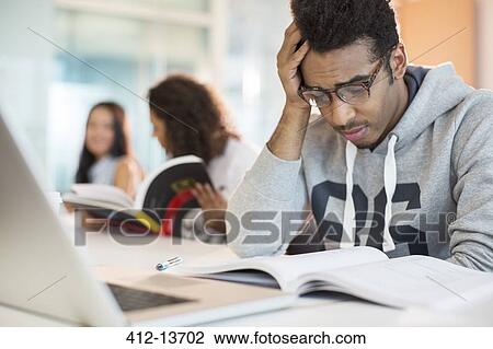University student reading in classroom View Large Photo Image Stock Image - University student reading in classroom. Fotosearch
