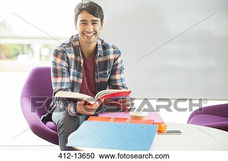 University student reading in lounge View Large Photo Image Stock Image - University student reading in lounge. Fotosearch