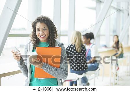 University student smiling in cafe View Large Photo Image Stock Image - University student smiling in cafe. Fotosearch