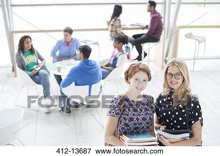 University students smiling in lounge View Large Photo Image Stock Photo - University students smiling in lounge. Fotosearch