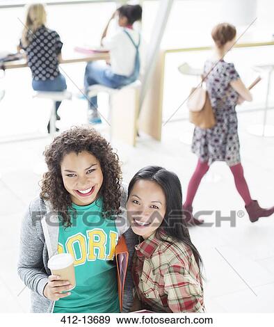 University students smiling in lounge View Large Photo Image Stock Photo - University students smiling in lounge. Fotosearch