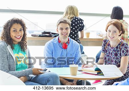 University students smiling in lounge View Large Photo Image Stock Photography - University students smiling in lounge. Fotosearch