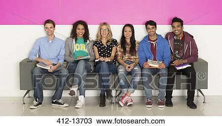 University students smiling on bench View Large Photo Image Stock Image - University students smiling on bench. Fotosearch
