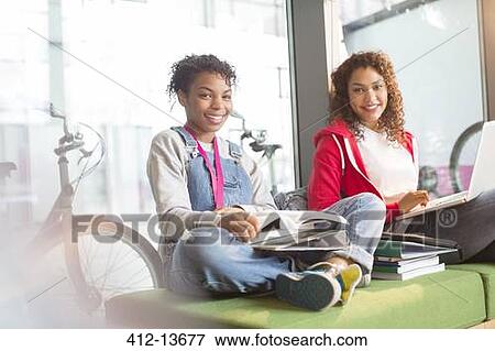 University students smiling on bench View Large Photo Image Stock Photo - University students smiling on bench. Fotosearch