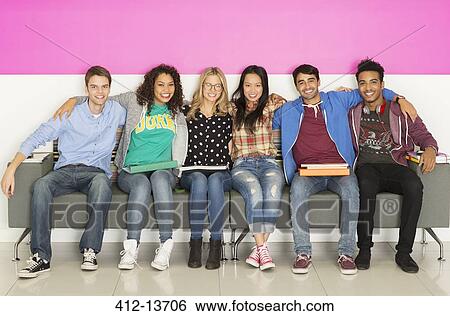 University students smiling on bench View Large Photo Image Stock Photograph - University students smiling on bench. Fotosearch
