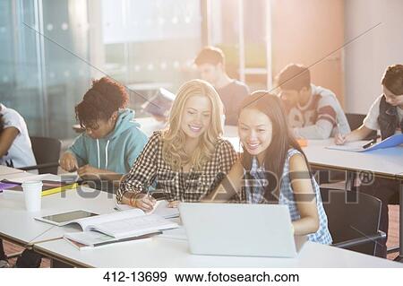 University students working in classroom View Large Photo Image Stock Photo - University students working in classroom. Fotosearch