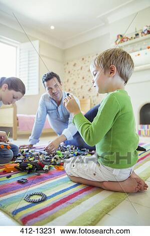 Father playing with children View Large Photo Image Stock Image - Father playing with children. Fotosearch
