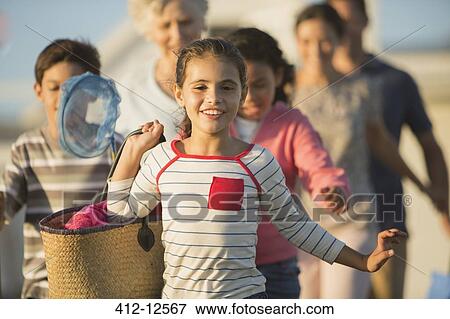 Multi-generation family on beach View Large Photo Image Stock Photo - Multi-generation family on beach. Fotosearch