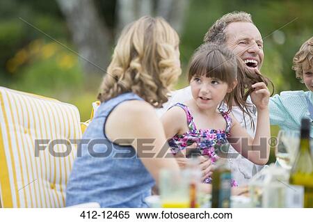 Family eating on patio View Large Photo Image Stock Photography - Family eating on patio. Fotosearch