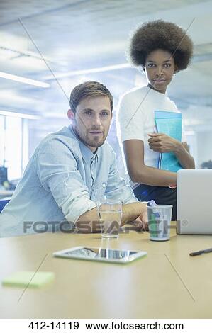 Stock Photo - Business people in meeting. Fotosearch