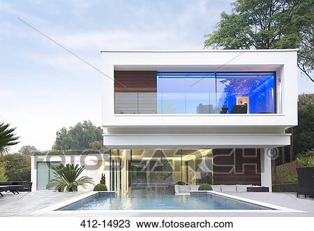 Glowing room of modern house View Large Photo Image Stock Image - Glowing room of modern house. Fotosearch