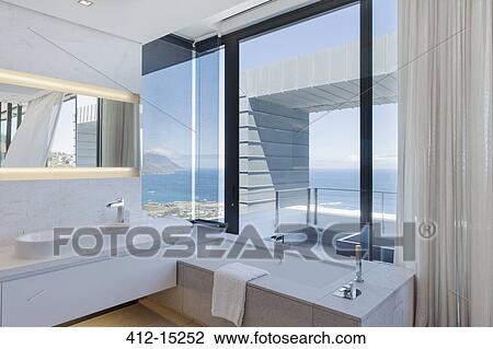 Bathroom in modern house View Large Photo Image Stock Image - Bathroom in modern house. Fotosearch